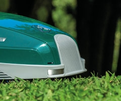 Robotic lawn mower with front bumper